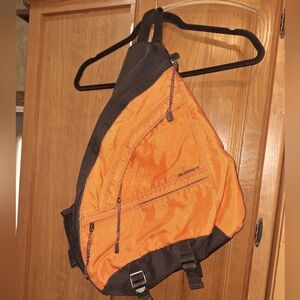 Old Navy orange large sling bag. Pre-owned but in good condition.
